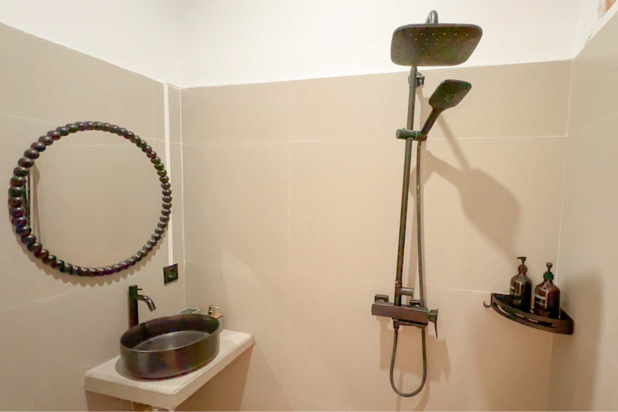 First enclosed bathroom and rain shower