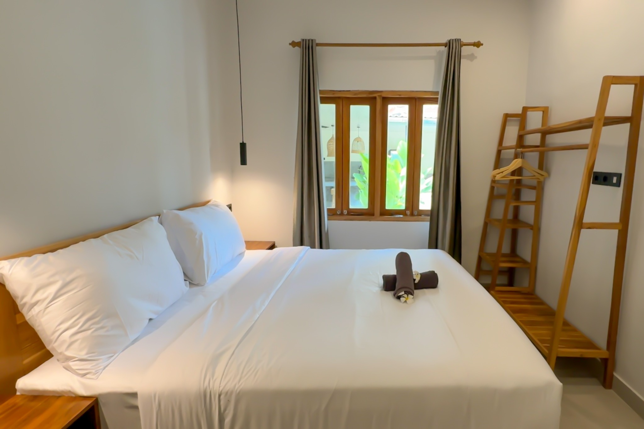 Double bedroom with warm wood details